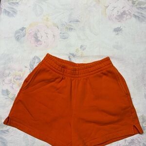 Reformation Orange High-Rise Athletic Shorts
